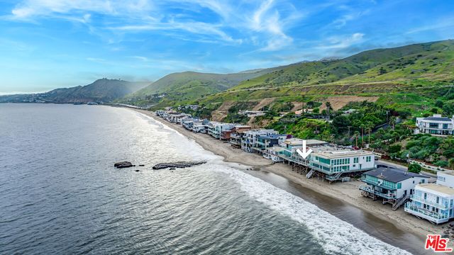 a view of a lake with mountain