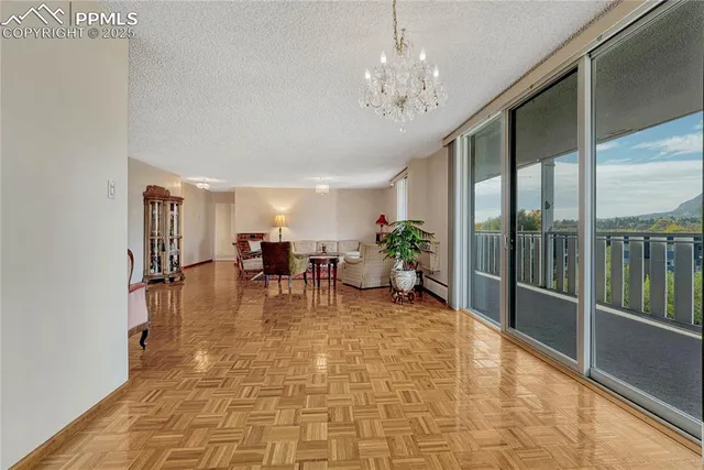 a view of a dining room with furniture window and outside view