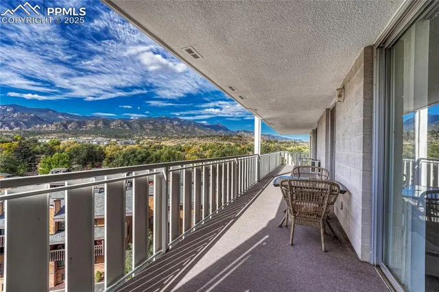 a view of balcony with furniture