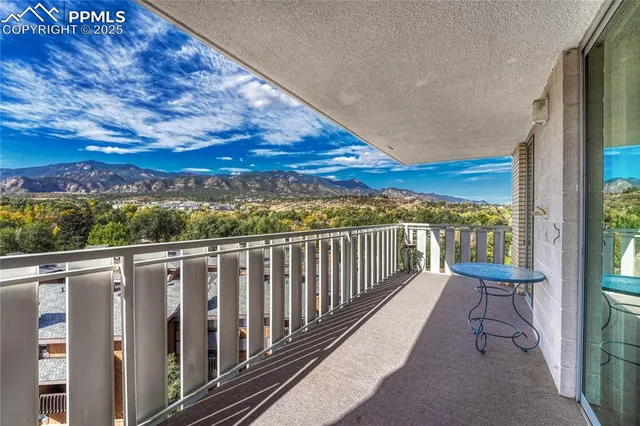 a view of balcony with furniture