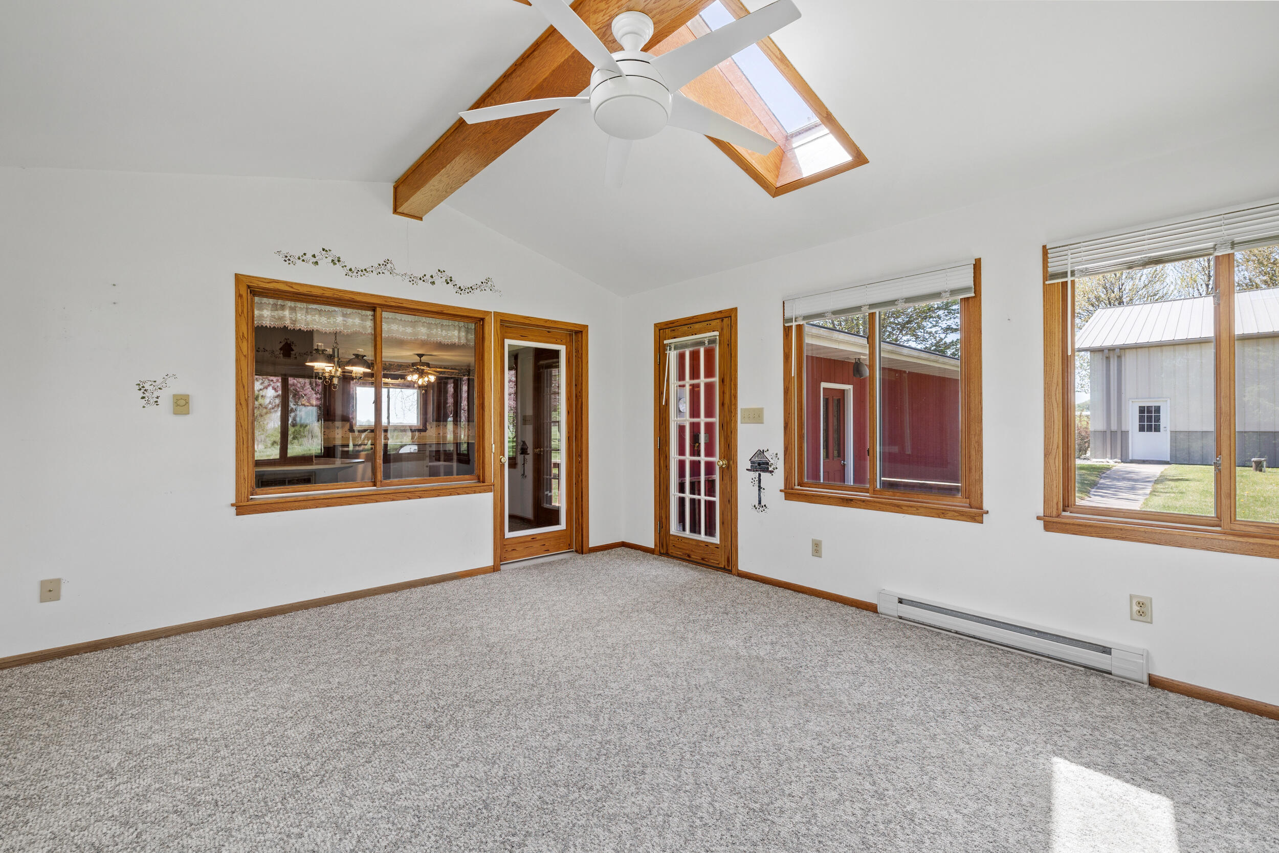 W1586 County Rd H New Holstein, WI 53061 - Photo 11 of 41 3 Season Room