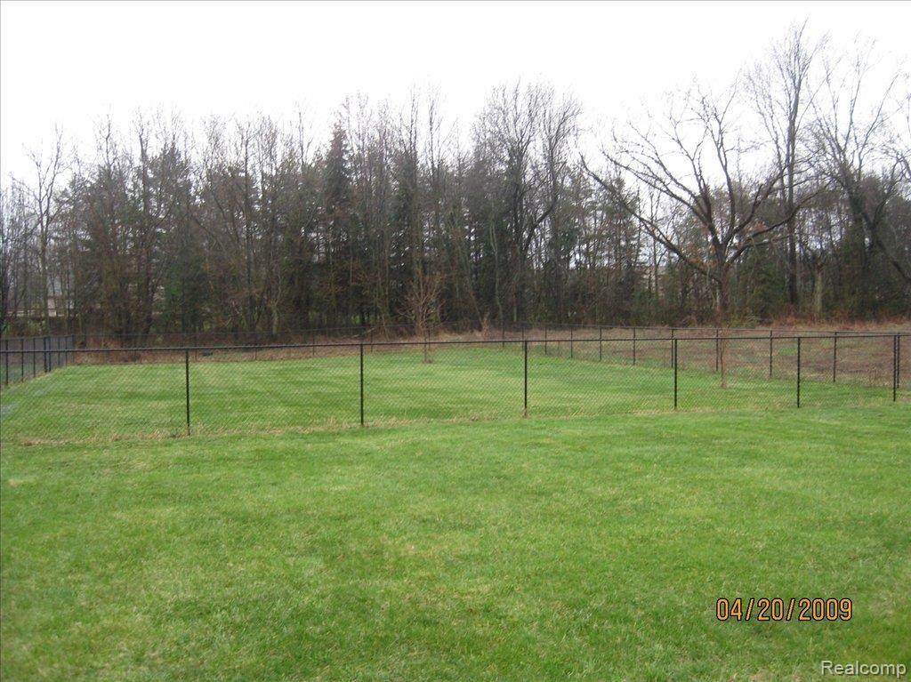 4456 Pinckney Road Howell, MI 48843 - Photo 2 of 8 fenced area in back yard