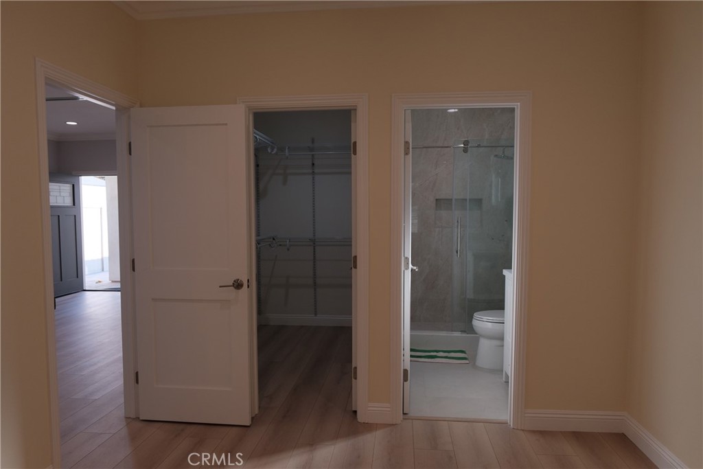 500 North Resh Place, Unit B Anaheim, CA 92805 - Photo 5 of 14 a bathroom with a toilet and a shower