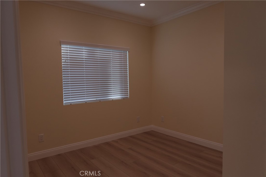 500 North Resh Place, Unit B Anaheim, CA 92805 - Photo 8 of 14 an empty room with a window