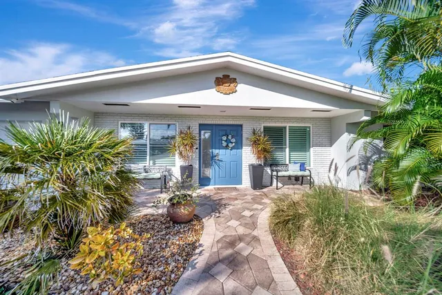 a view of yard with patio
