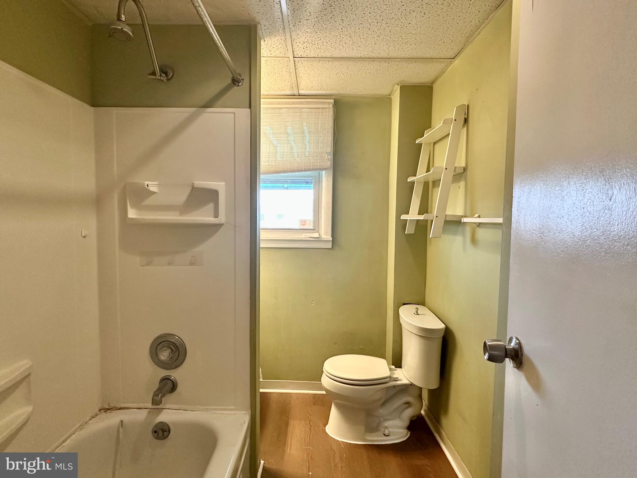 116 Tindall Avenue Hamilton, NJ 08610 - Photo 7 of 12 a bathroom with a sink and a mirror