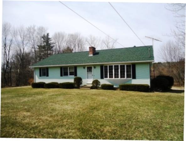 1737 Petersham Road Hardwick, MA 01037 - Photo 1 of 17 a front view of a house with a yard