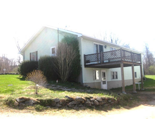 1737 Petersham Road Hardwick, MA 01037 - Photo 3 of 17 a view of a house with a yard