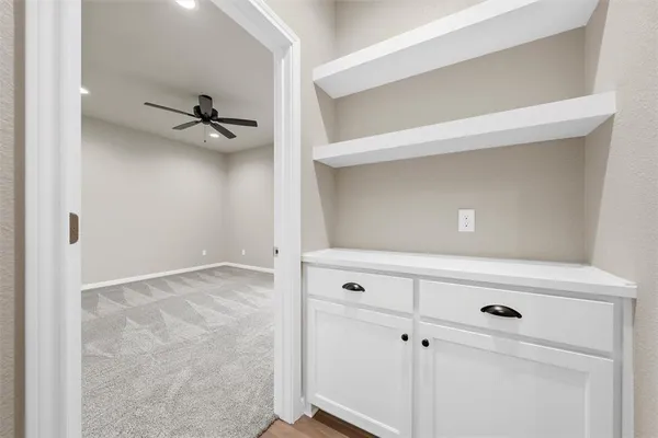 a view of a hallway with closet