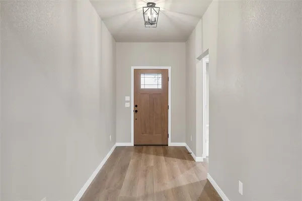 a view of an entryway with a window