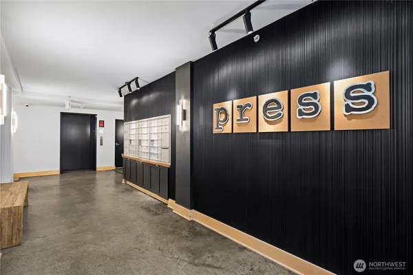 a view of a hallway with stairs