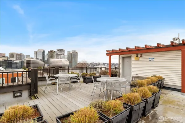 a view of roof deck with patio