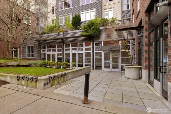 a view of a brick building with a outdoor space