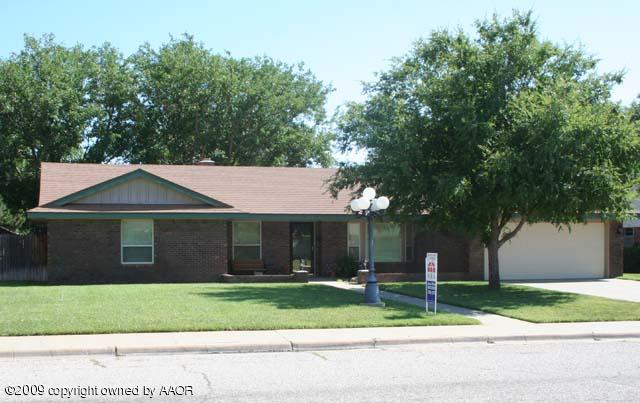6904 Elmhurst Road Amarillo, TX 79106 - Photo 1 of 15 a front view of a house with a yard