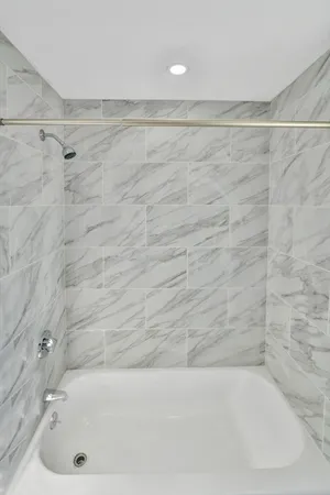 a bathroom with a bathtub