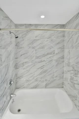 a bathroom with a bathtub