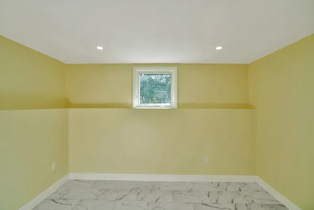 a view of room and wooden floor