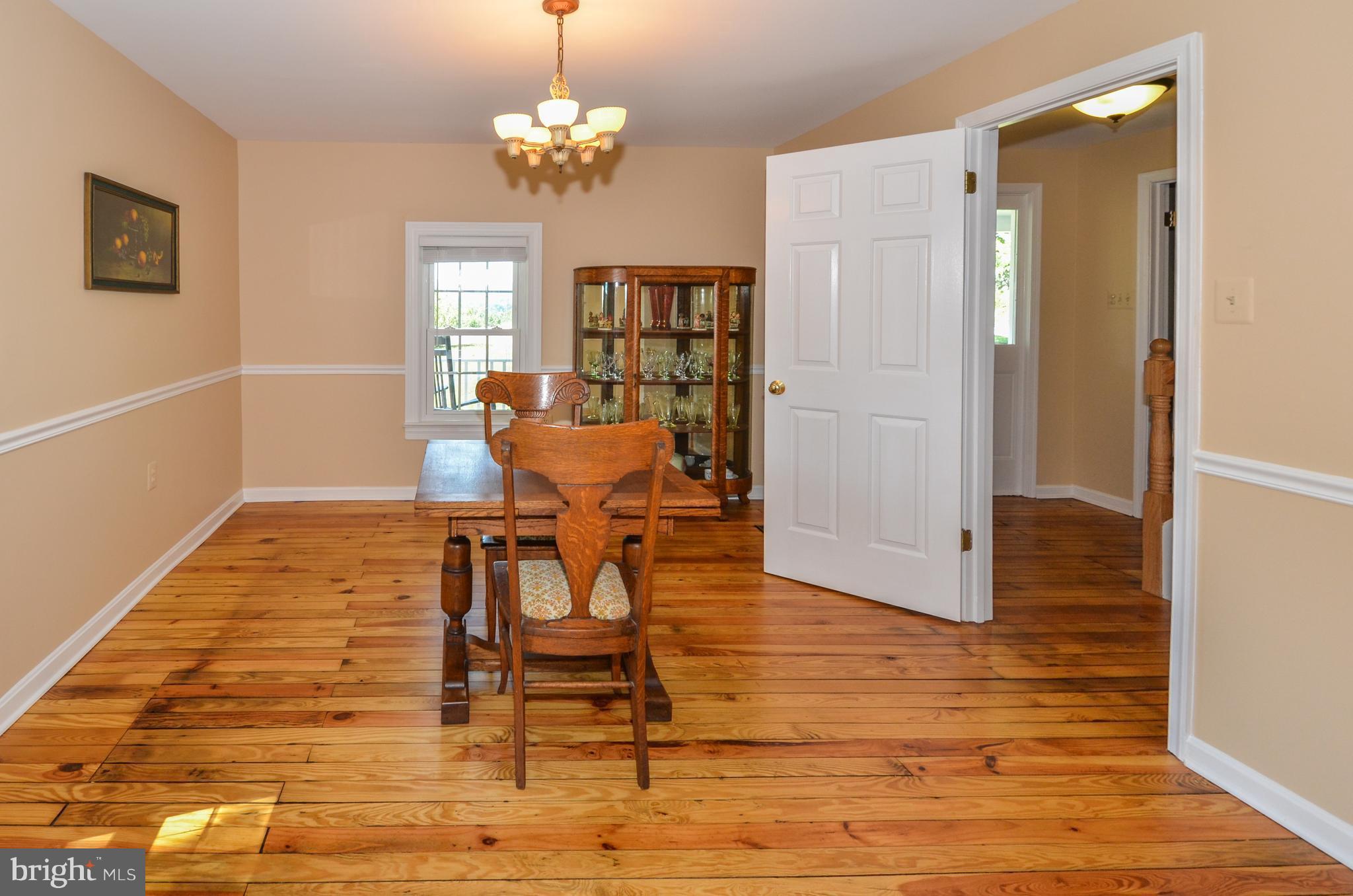18912 Black Oak Road Purcellville, VA 20132 - Photo 14 of 66 Dining Room off of Kitchen w/ chair moldings