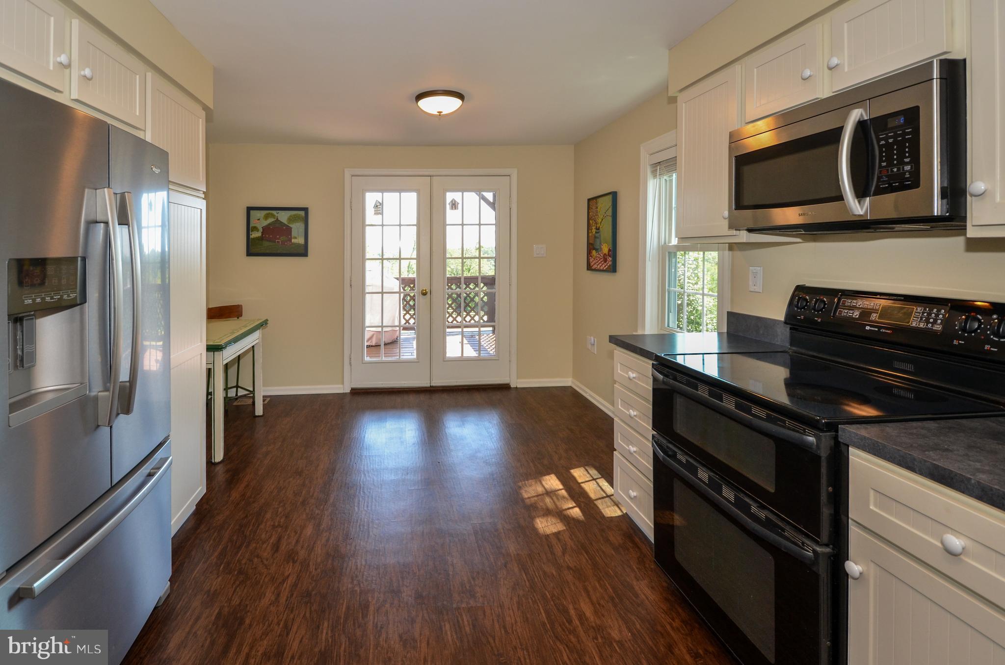 18912 Black Oak Road Purcellville, VA 20132 - Photo 7 of 66 Kitchen opens to rear deck