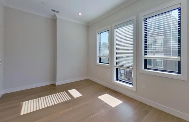 an empty room with windows