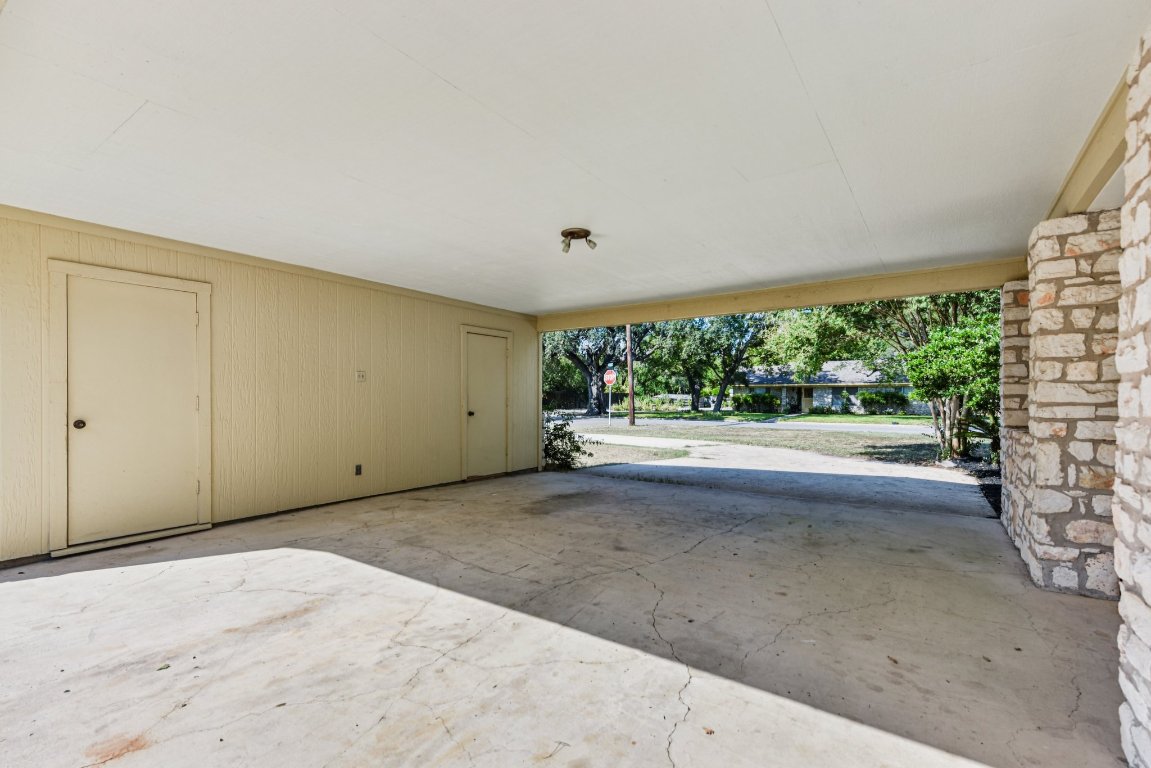 503 Hackberry Street Lockhart, TX 78644 - Photo 13 of 36 Garage with a carport