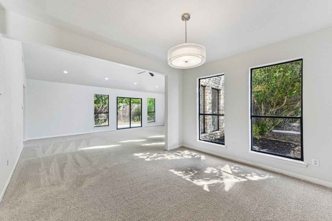503 Hackberry Street Lockhart, TX 78644 - Photo 15 of 36 Carpeted empty room with recessed lighting