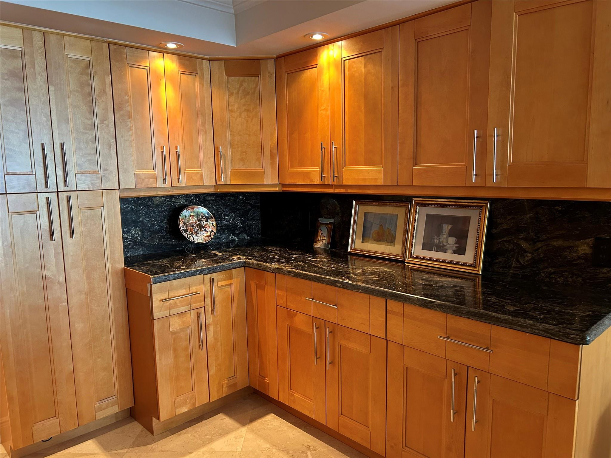 Undisclosed Address Pompano Beach, FL 33062 - Photo 19 of 55 a kitchen with a sink and a microwave