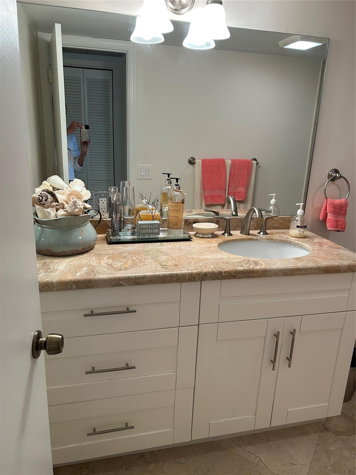 Undisclosed Address Pompano Beach, FL 33062 - Photo 26 of 55 a bathroom with a granite countertop sink and a mirror