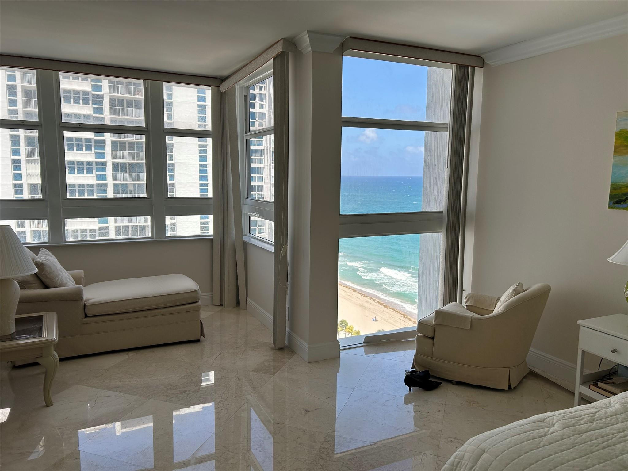 Undisclosed Address Pompano Beach, FL 33062 - Photo 29 of 55 a living room with furniture and a window