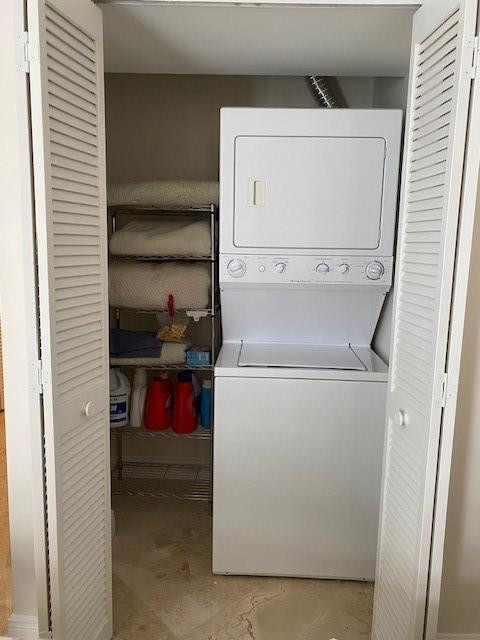 Undisclosed Address Pompano Beach, FL 33062 - Photo 31 of 55 a utility room with dryer and washer