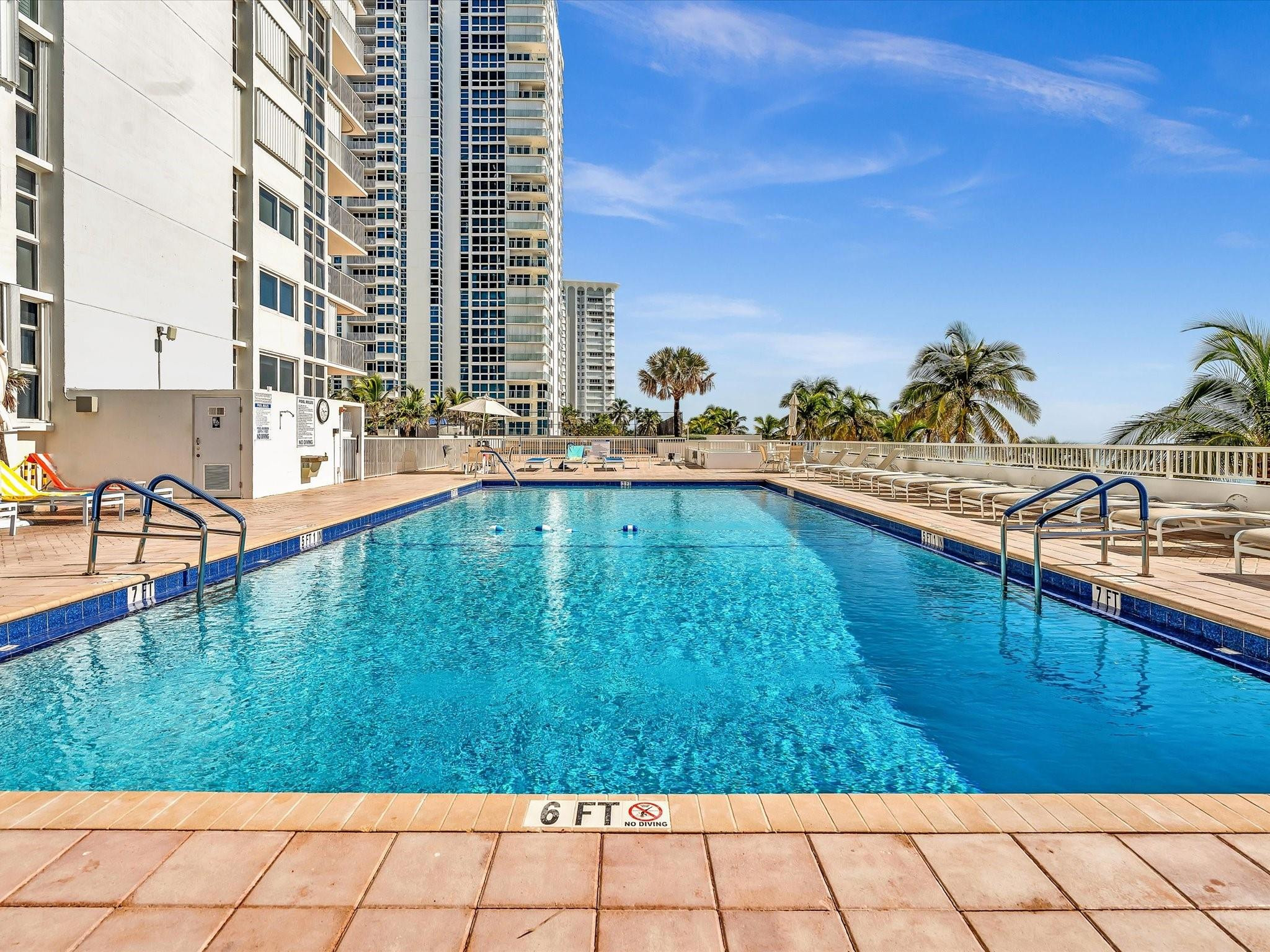 Undisclosed Address Pompano Beach, FL 33062 - Photo 34 of 55 a view of swimming pool with outdoor seating