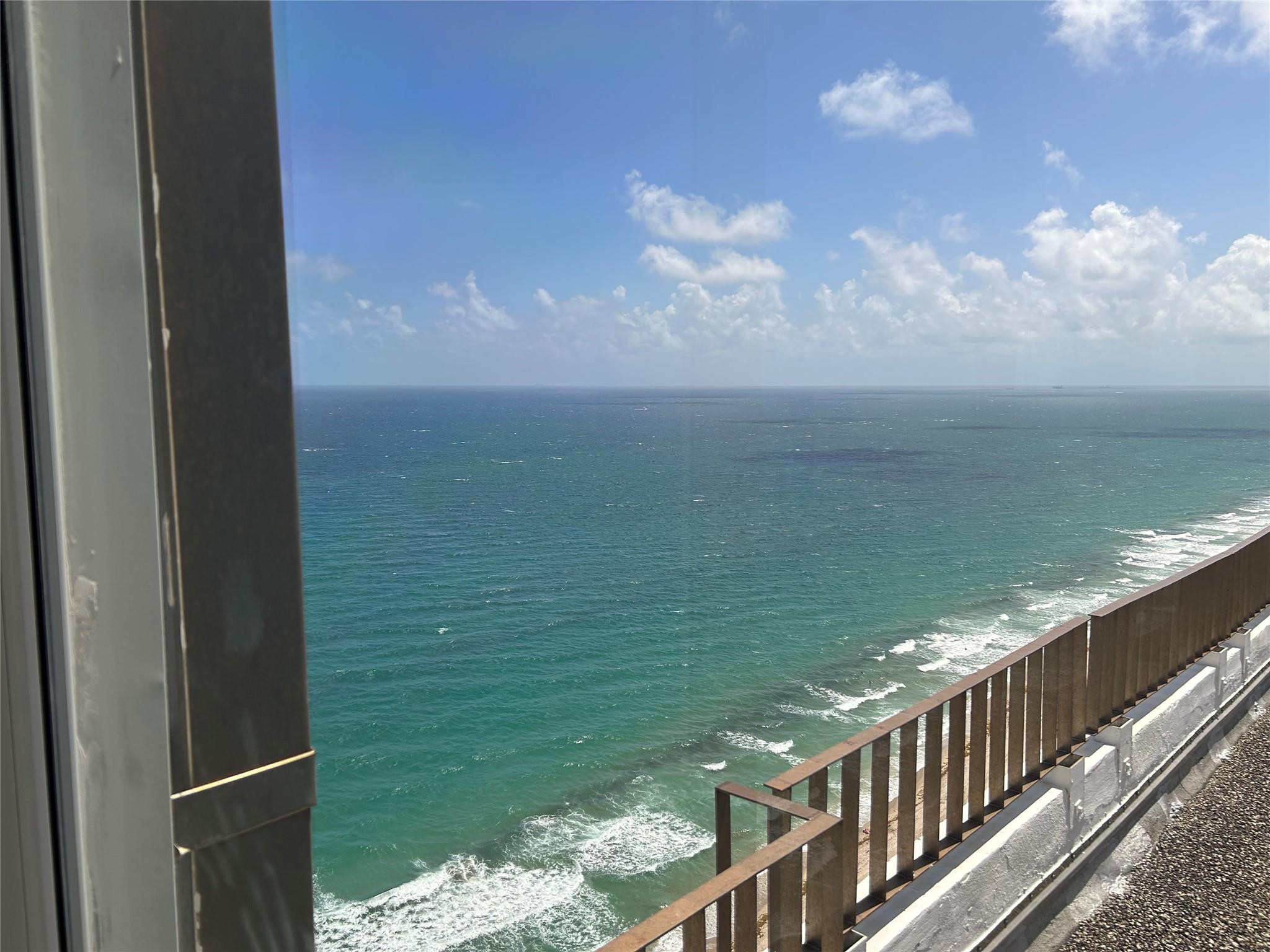 Undisclosed Address Pompano Beach, FL 33062 - Photo 46 of 55 a balcony with an ocean view