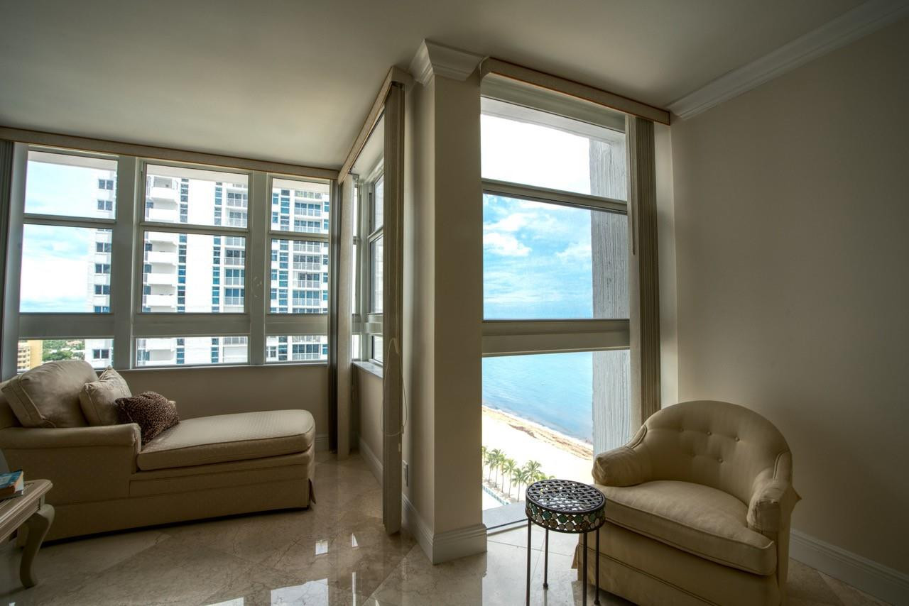 Undisclosed Address Pompano Beach, FL 33062 - Photo 10 of 55 a living room with furniture and a window