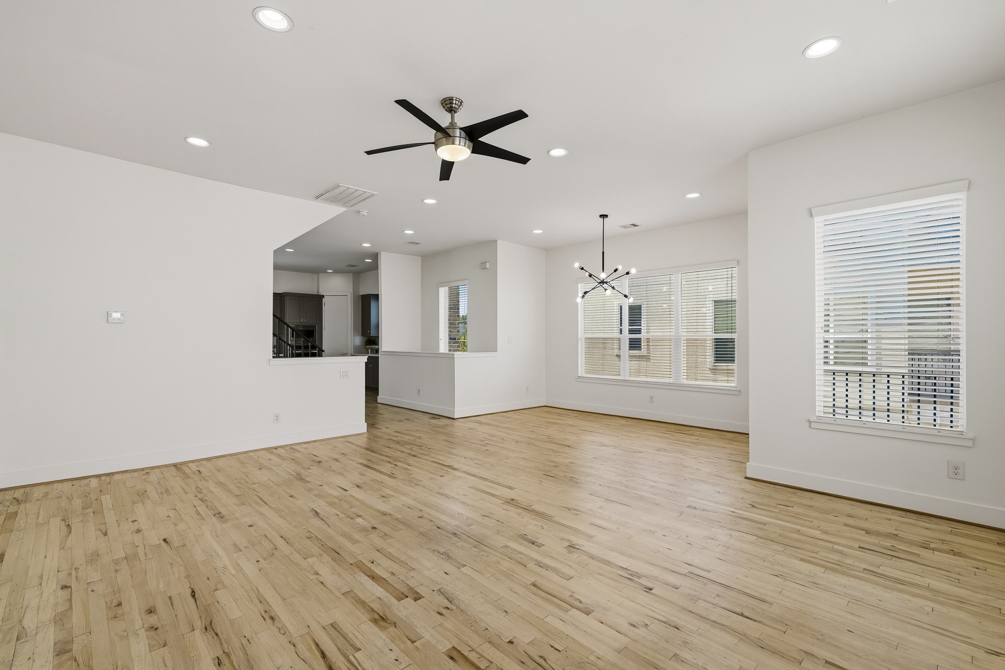 2004 Rosedale Street, Unit D Houston, TX 77004 - Photo 14 of 45 The family room opens seamlessly to both the dining room and kitchen creating an open, connected setting that keeps conversation flowing from one space to the next.