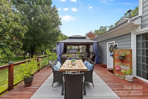 swimming pool view with a seating space