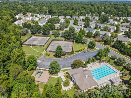 an aerial view of a house with a garden