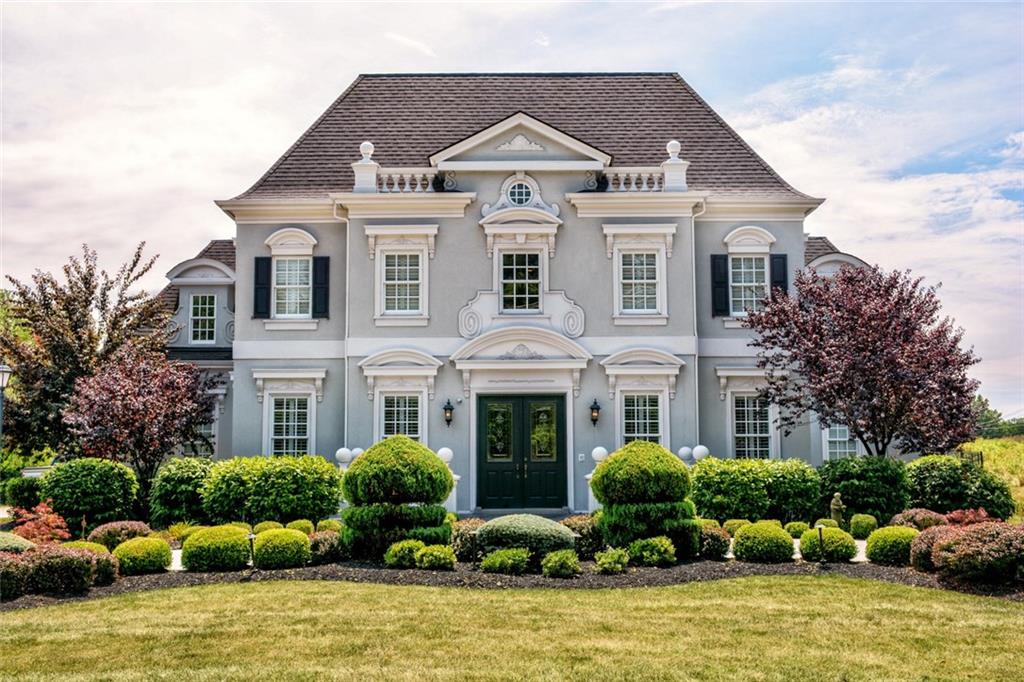 208 Logan Road Gibsonia, PA 15044 - Photo 1 of 25 Live in luxury and entertain in style in this magnificent Colonial Manor with European flair.