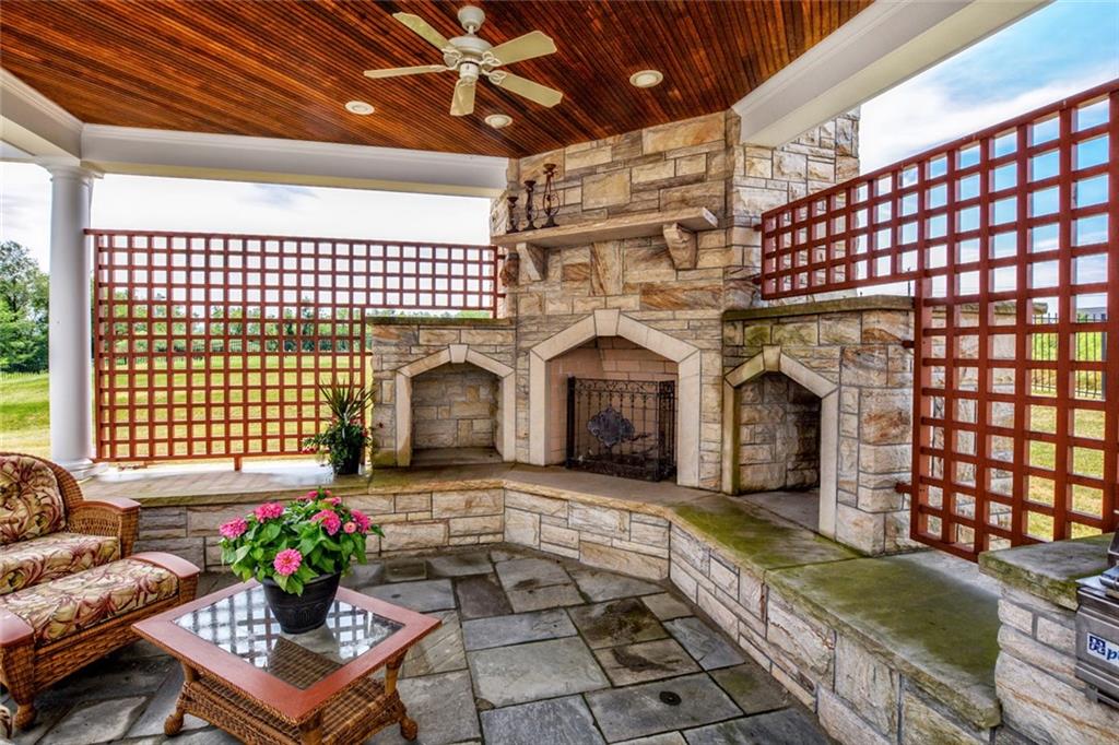 208 Logan Road Gibsonia, PA 15044 - Photo 14 of 25 Pergola and fireplace