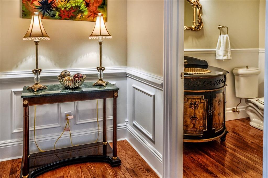 208 Logan Road Gibsonia, PA 15044 - Photo 15 of 25 First floor powder room accented with exquisite Bombay chest.