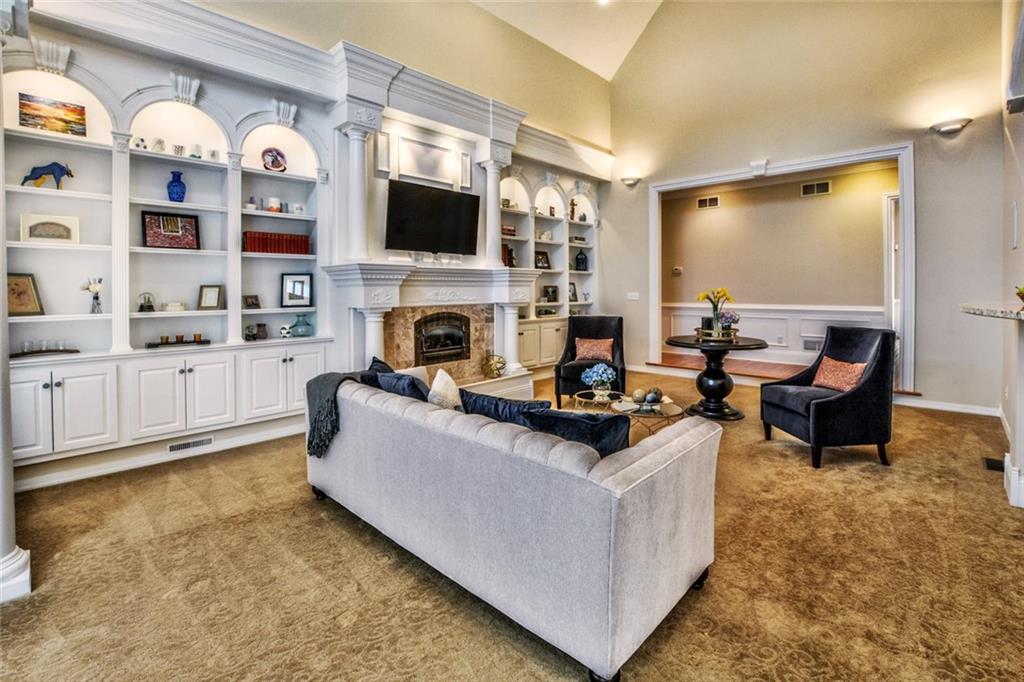 208 Logan Road Gibsonia, PA 15044 - Photo 3 of 25 Highly detailed millwork sets the stage for this dramatic great room with soaring ceilings.