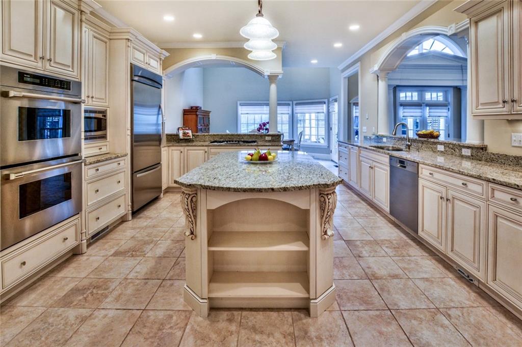 208 Logan Road Gibsonia, PA 15044 - Photo 5 of 25 Flawless attention to detail defines the extraordinary gourmet kitchen with Cuisines Laurier cabinetry, Thermador and Bosch stainless steel appliances, granite counter tops and a spectacular adjacent butler's pantry.