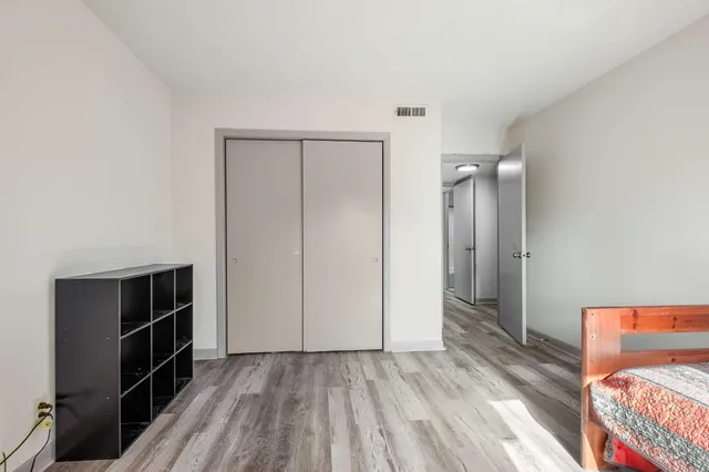 a view of hallway with walk in closet
