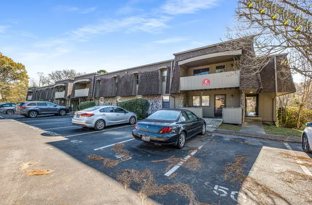 a car parked in front of a house