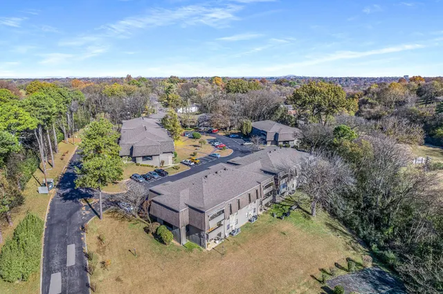 an aerial view of residential house with outdoor space