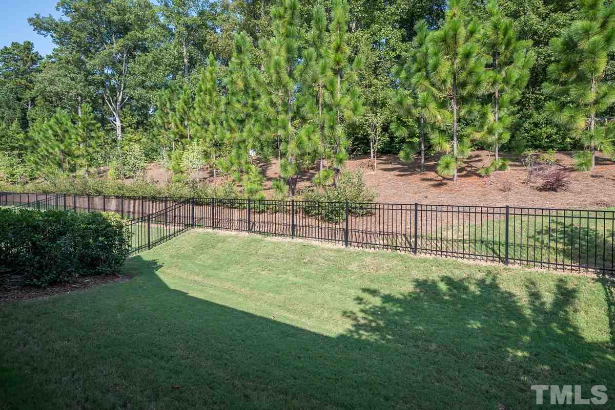 4025 Periwinkle Blue Lane Raleigh, NC 27612 - Photo 21 of 23 a view of a backyard