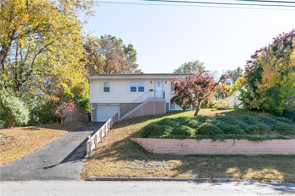 330 Fairfax Road Bridgeport, CT 06610 - Photo 1 of 1 a view of a house with a yard