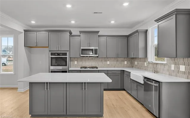 $555,000 | 8605 Lemur Lane, Summerfield, NC 27358