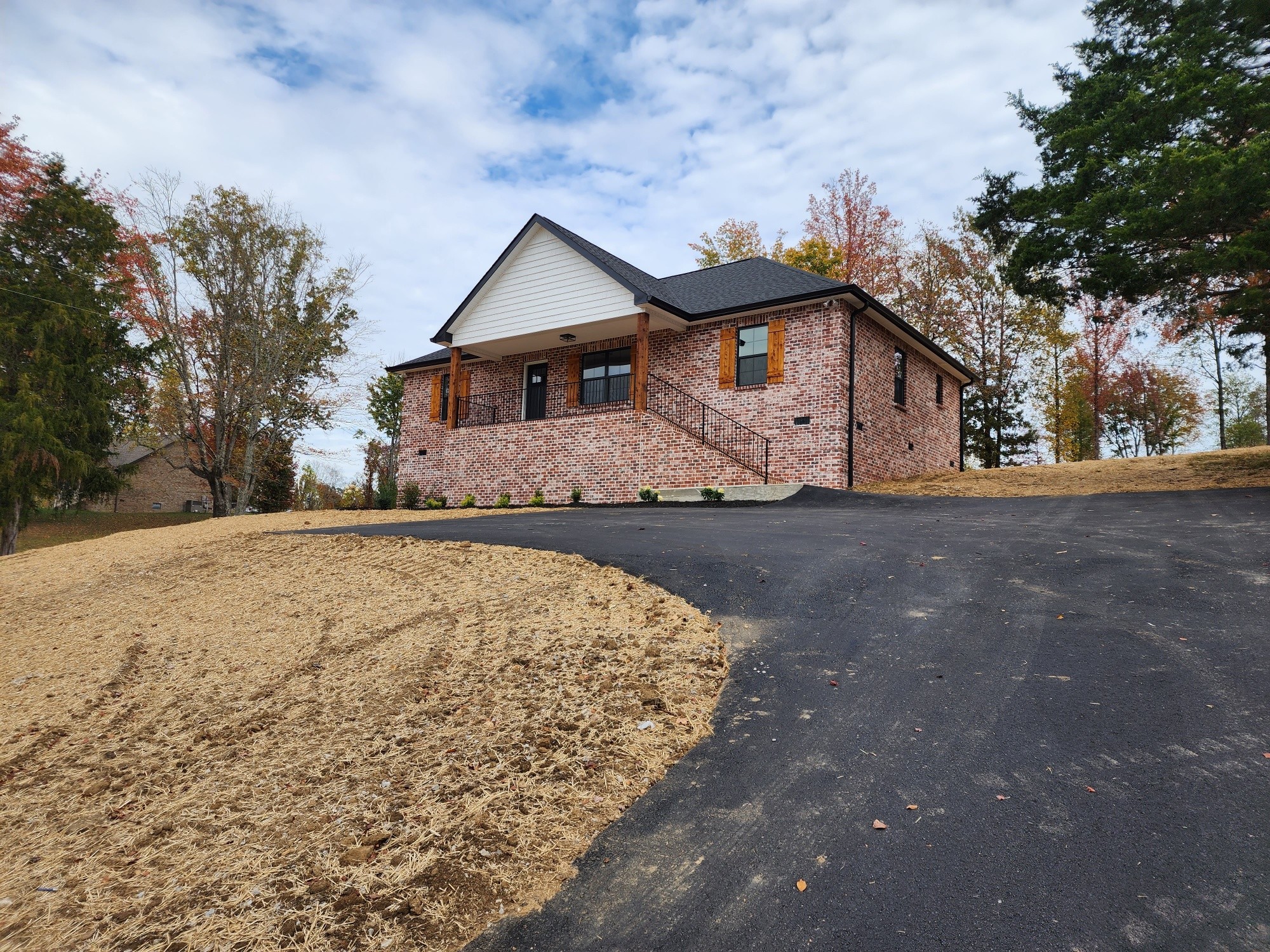 1672 Rock Bridge Road Bethpage, TN 37022 - Photo 1 of 26 a front view of a house with a yard