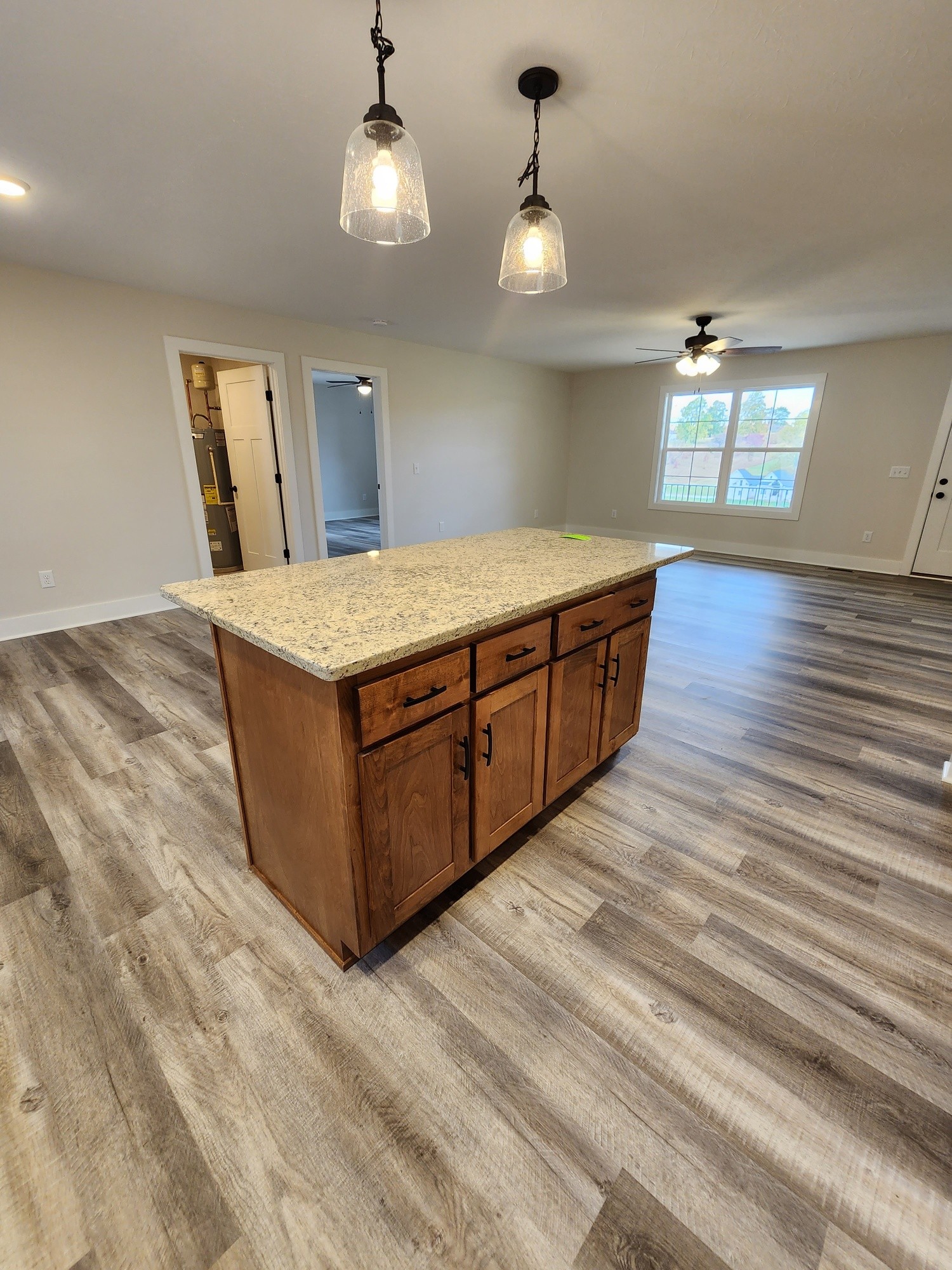 1672 Rock Bridge Road Bethpage, TN 37022 - Photo 13 of 26 a living room with stainless steel appliances granite countertop furniture and a chandelier