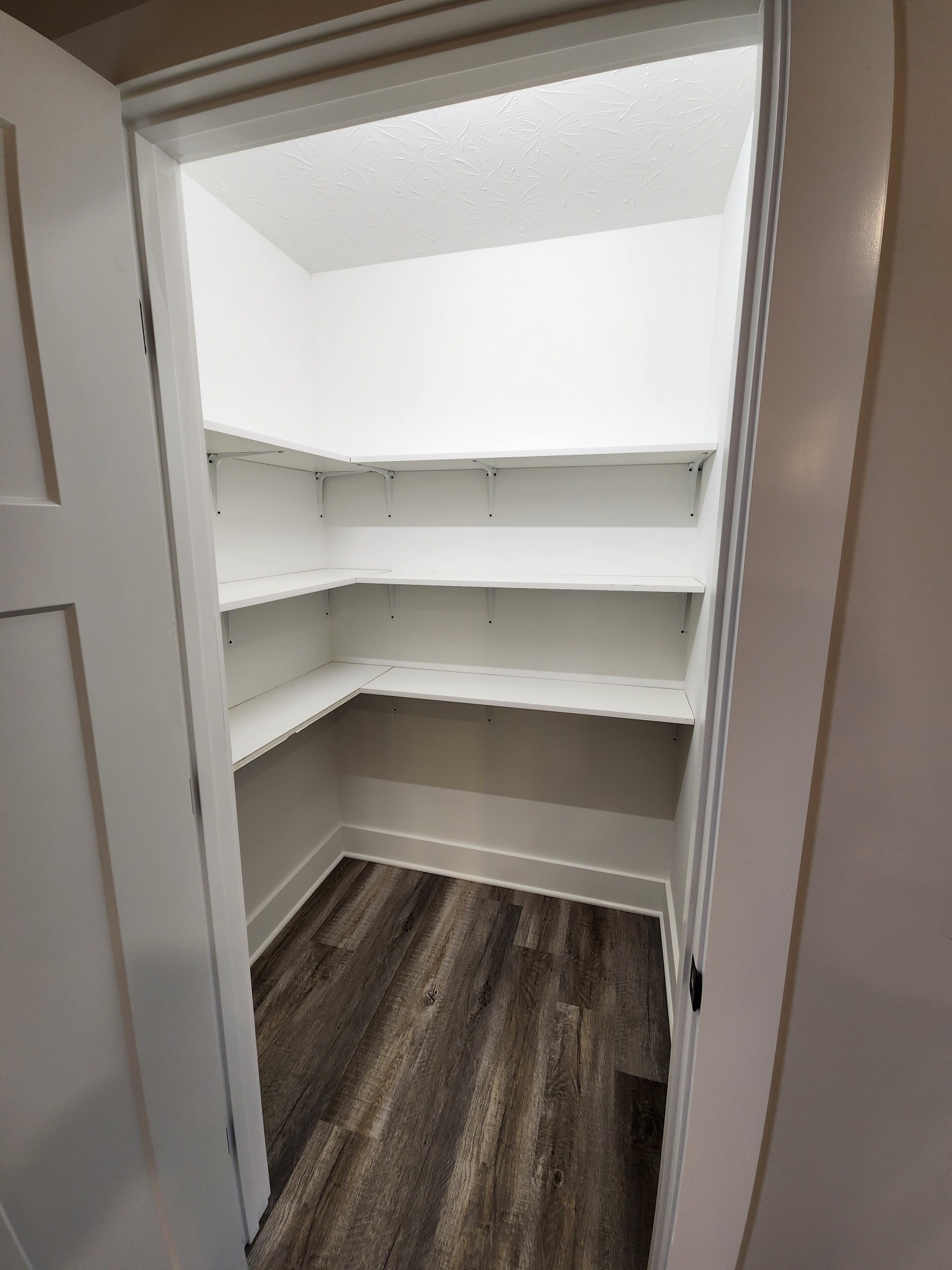 1672 Rock Bridge Road Bethpage, TN 37022 - Photo 25 of 26 a storage room with wooden floor